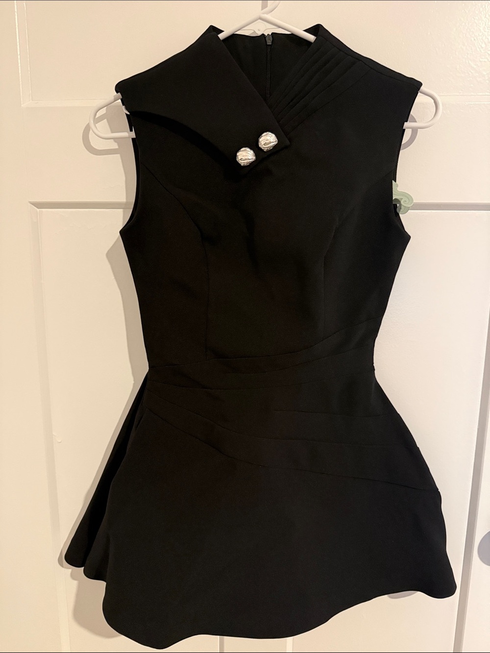Elegant Black Sleeveless Mini Dress with Asymmetric Collar